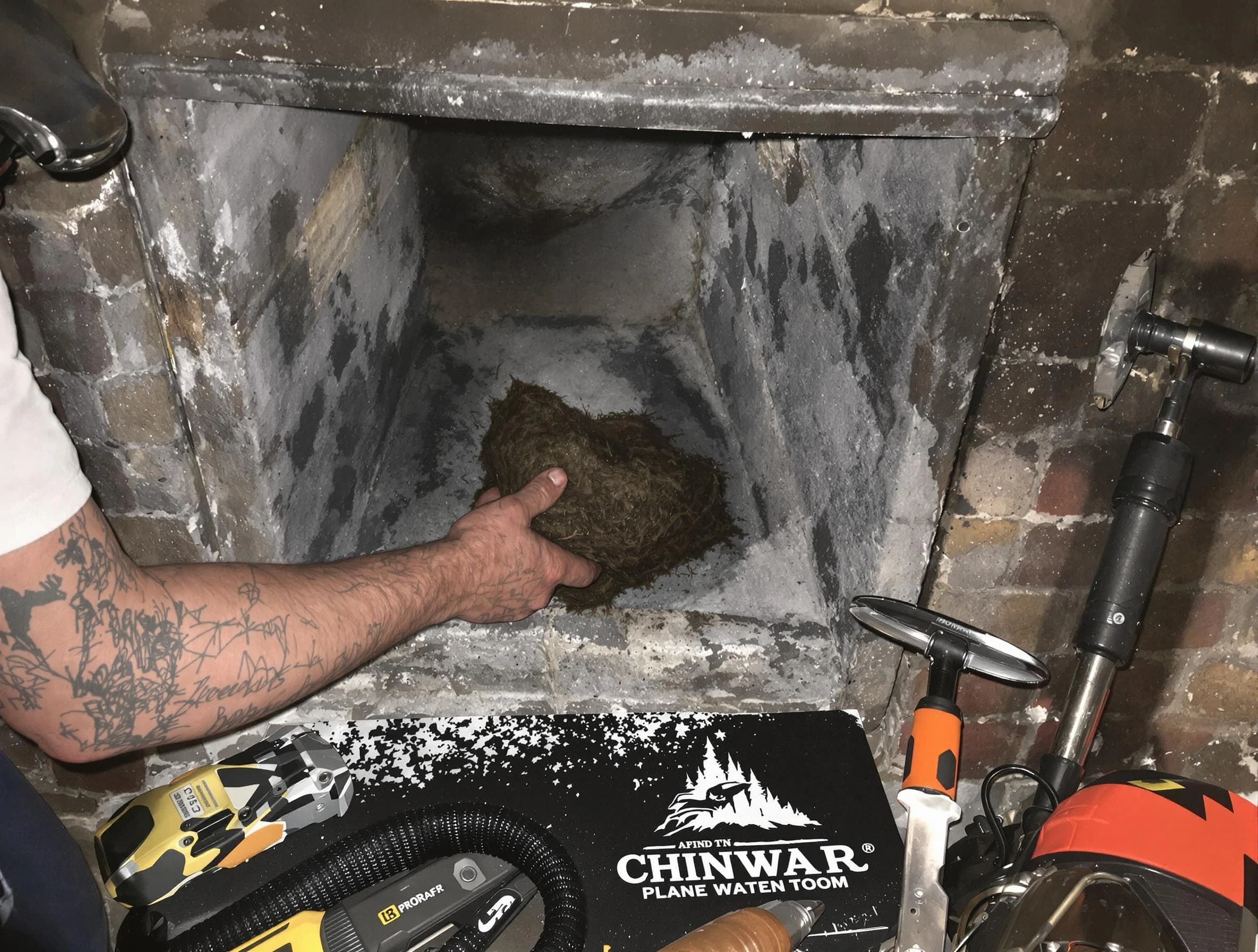 Westfield Chimney Sweep safely removing debris and screening chimney in Westfield, NJ